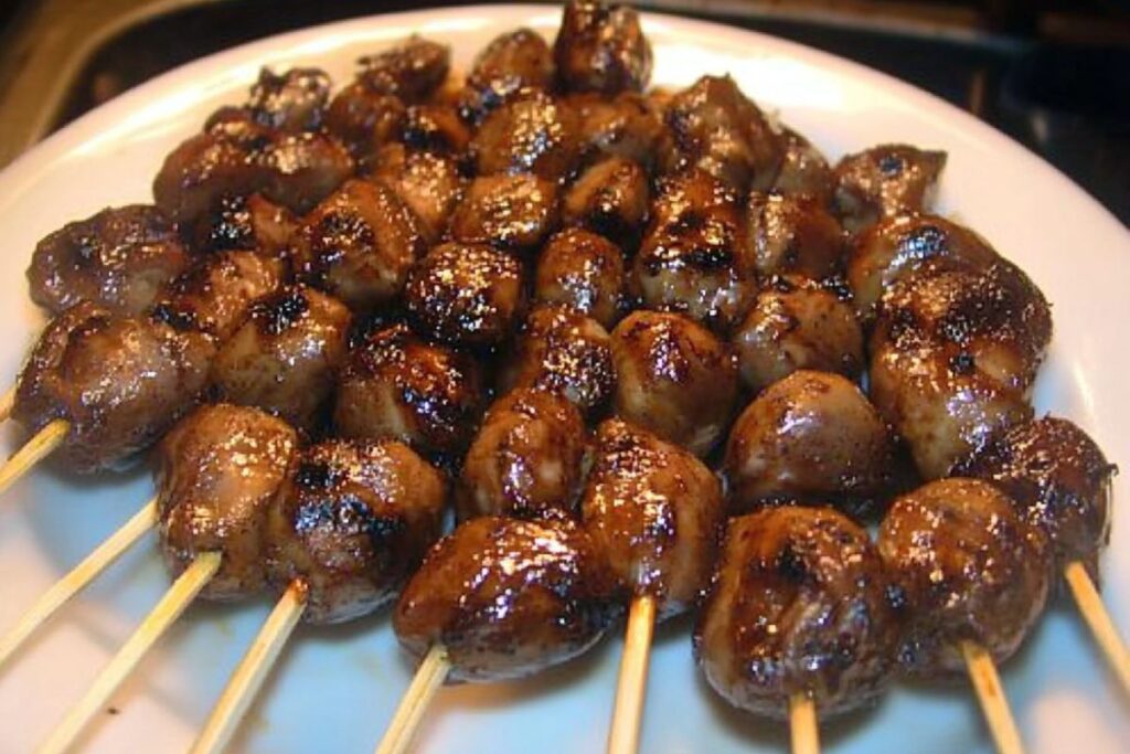 grilled chicken hearts on skewers
