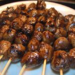 grilled chicken hearts on skewers